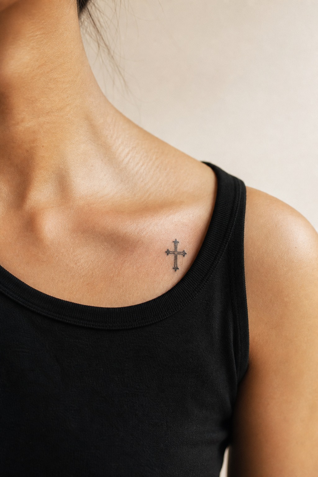 Micro heraldic gothic cross collarbone tattoo