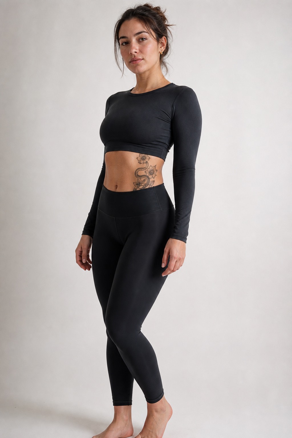 Fine line snake and rose hip wrap tattoo for women