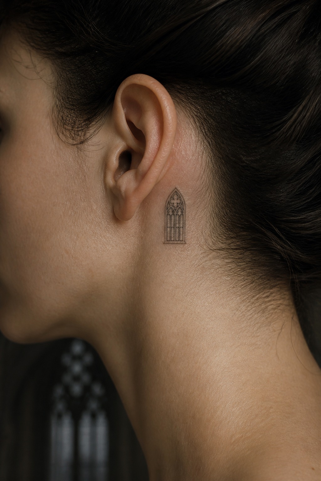 Fine line micro window behind the ear tattoo