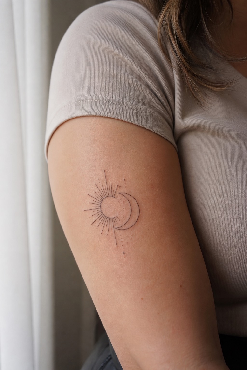 Fine line sun and moon harmony tattoo for women