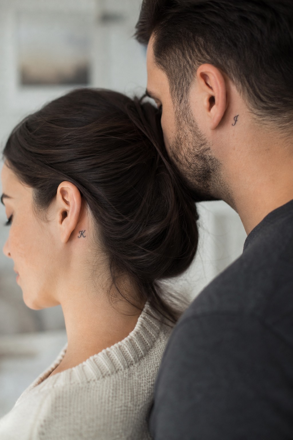 Behind the ear initial accent hidden couple tattoos
