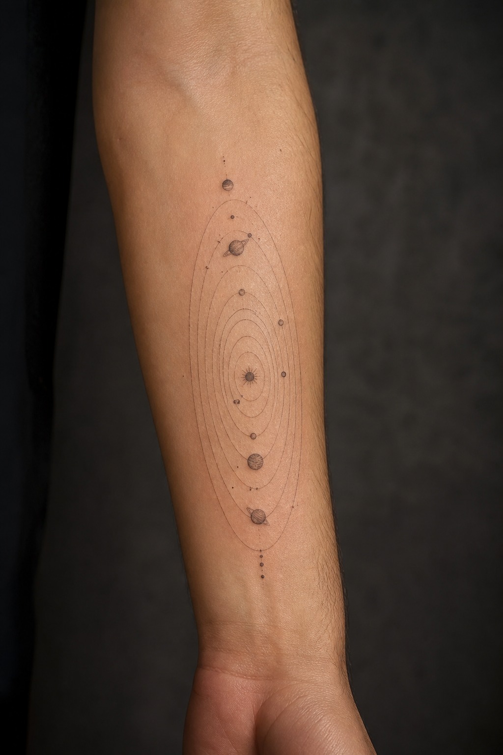 Astronomical solar system planet orbits forearm tattoo