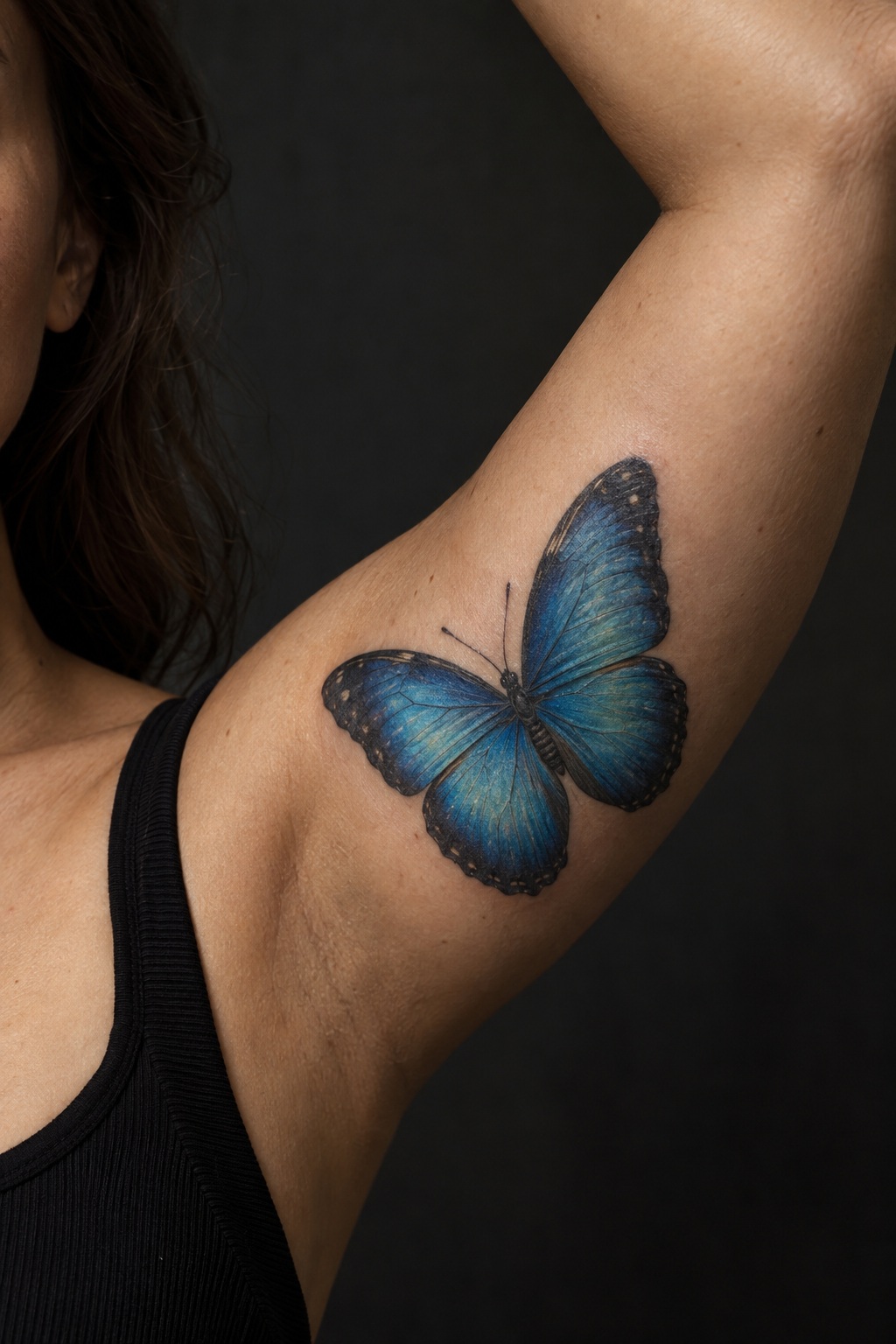 Blue Morpho butterfly inner bicep tattoo