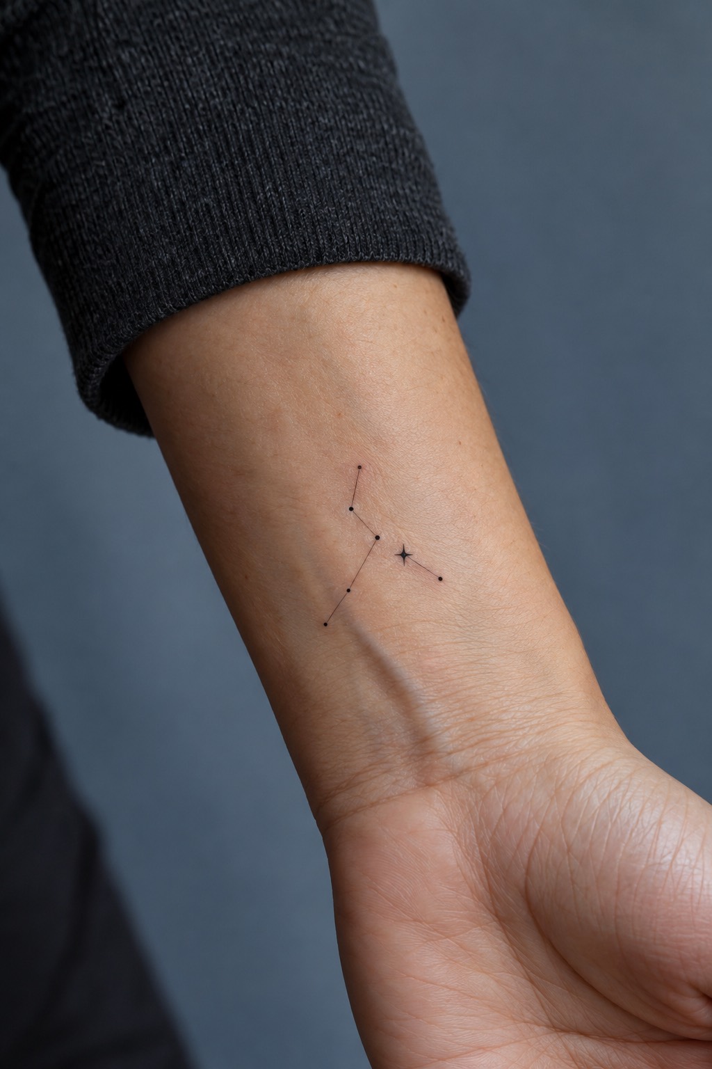 Minimalist Star Constellation and North Star Beginner Tattoo Idea